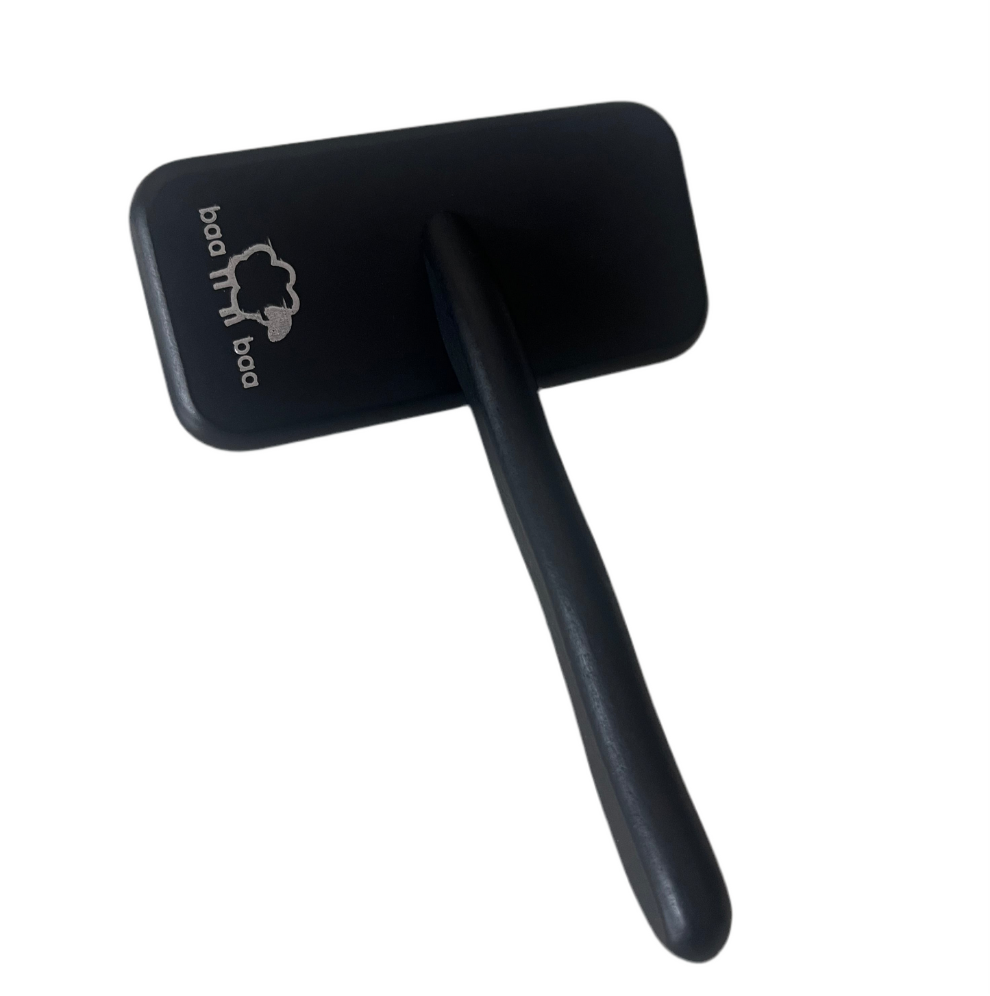 Black grooming brush with a visible brand logo on a white background
