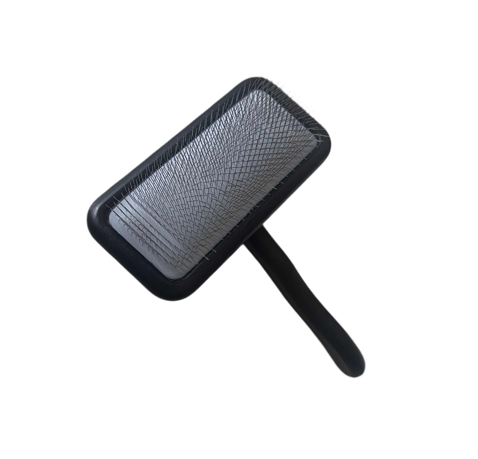 Black pet grooming brush on a white background